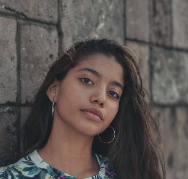 Young woman stone wall portrait